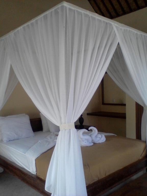 Manada Guesthouae Bed & Breakfast Ubud Rom bilde